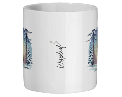 White mug with tree designs and the word 'Witch Hazel' on a white background